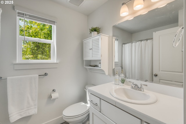 3037 SW Sherman Pl, Beaverton, OR 97003 - full bathroom featuring vanity, toilet, baseboards, and a shower with curtain