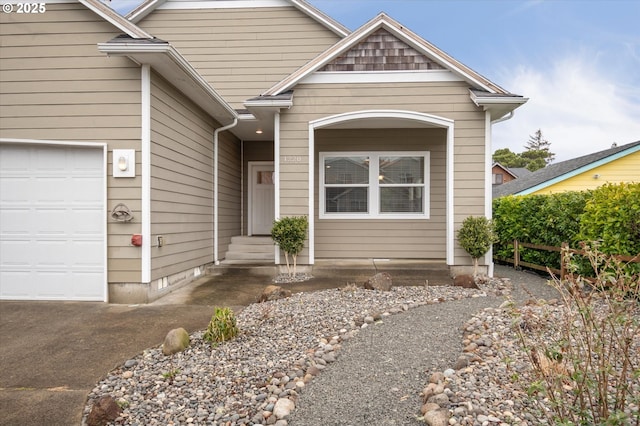 view of front of home with a garage