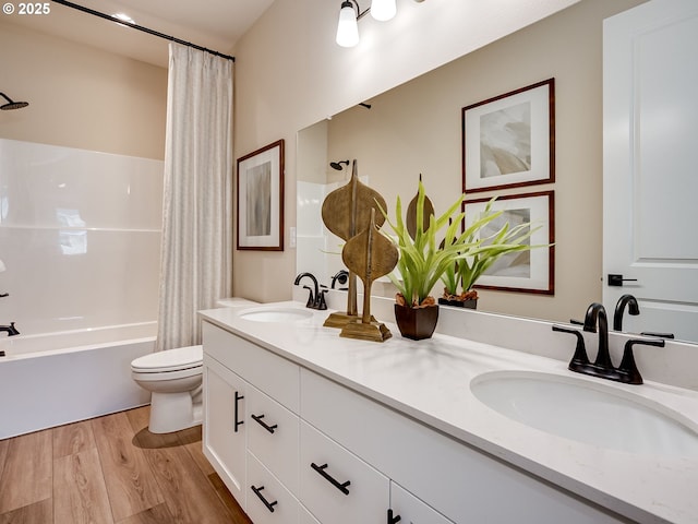 13009 NE 111th St, Vancouver, WA 98682 - full bathroom featuring double vanity, shower / bath combination with curtain, and wood finished floors
