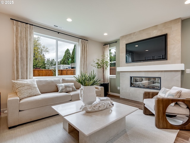 13009 NE 111th St, Vancouver, WA 98682 - living area featuring a fireplace, recessed lighting, wood finished floors, and plenty of natural light