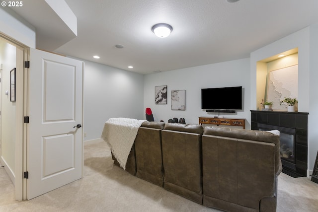 10137 SW Lancaster Rd, Portland, OR 97219 - living area with light carpet, a fireplace, and recessed lighting