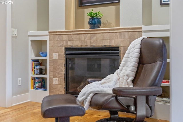 10137 SW Lancaster Rd, Portland, OR 97219 - detailed view of a fireplace, wood finished floors, and built in features