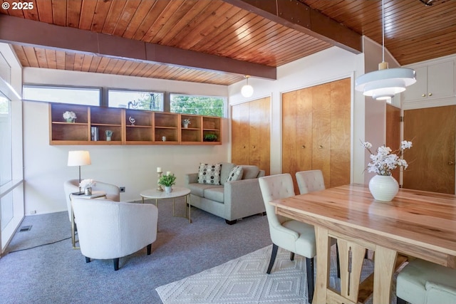 1439 Barton St, Eugene, OR 97404 - living room featuring wood ceiling with exposed beams and carpet