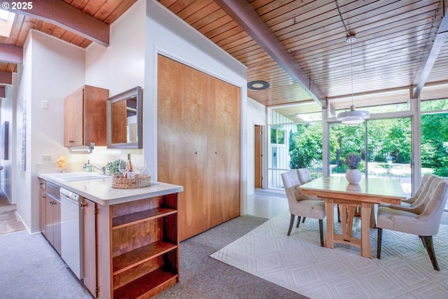 1439 Barton St, Eugene, OR 97404 - dining area with wood ceiling with exposed beams, light colored carpet, and expansive windows