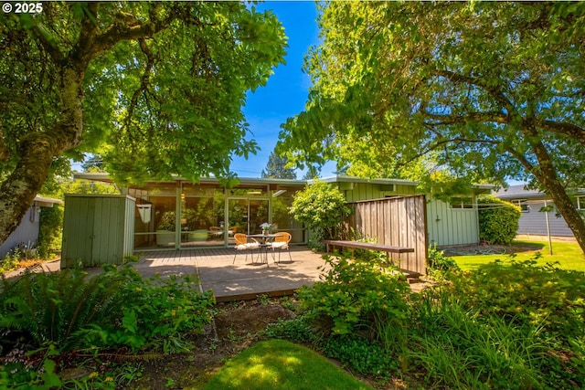 1439 Barton St, Eugene, OR 97404 - view of yard featuring a wooden deck
