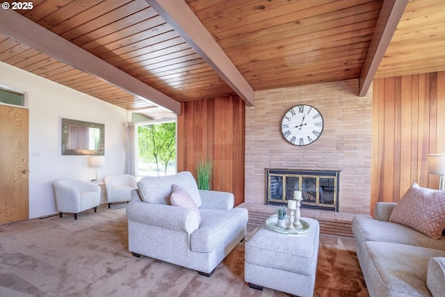 1439 Barton St, Eugene, OR 97404 - carpeted living area with wood ceiling with exposed beams, a glass covered fireplace, and wood walls
