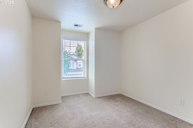 20372 SW Verona Ct, Beaverton, OR 97003 - unfurnished room with light colored carpet and a textured ceiling