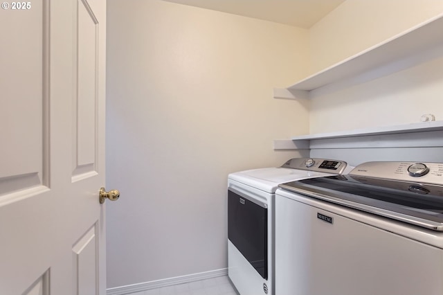 20372 SW Verona Ct, Beaverton, OR 97003 - laundry area with separate washer and dryer and baseboards