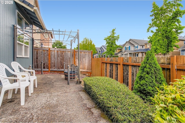 20372 SW Verona Ct, Beaverton, OR 97003 - fenced backyard with a residential view and a patio area