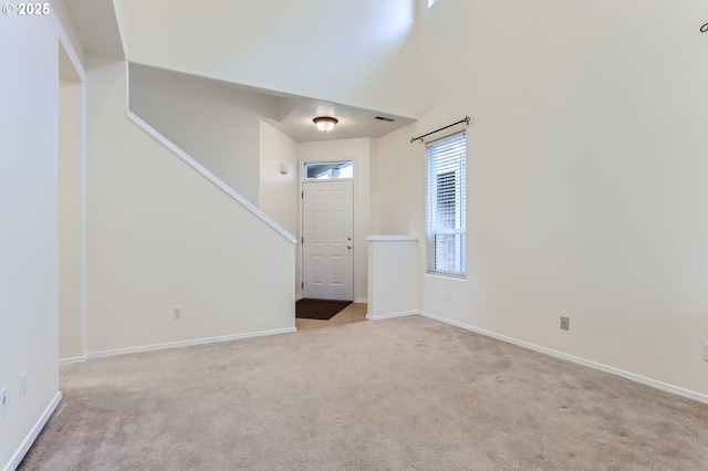 20372 SW Verona Ct, Beaverton, OR 97003 - foyer featuring carpet floors and stairway