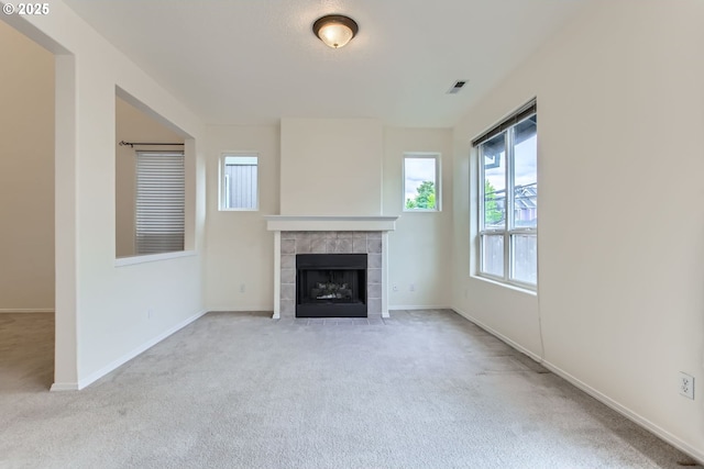20372 SW Verona Ct, Beaverton, OR 97003 - unfurnished living room featuring carpet and a tile fireplace