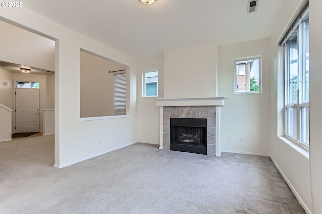 20372 SW Verona Ct, Beaverton, OR 97003 - unfurnished living room with carpet flooring and plenty of natural light