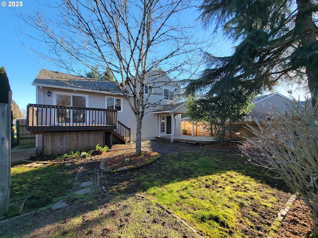 view of yard with a wooden deck