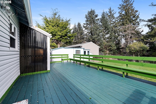 deck with an outdoor structure