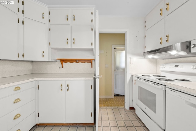 kitchen with white appliances, white cabinets, ornamental molding, light countertops, and under cabinet range hood