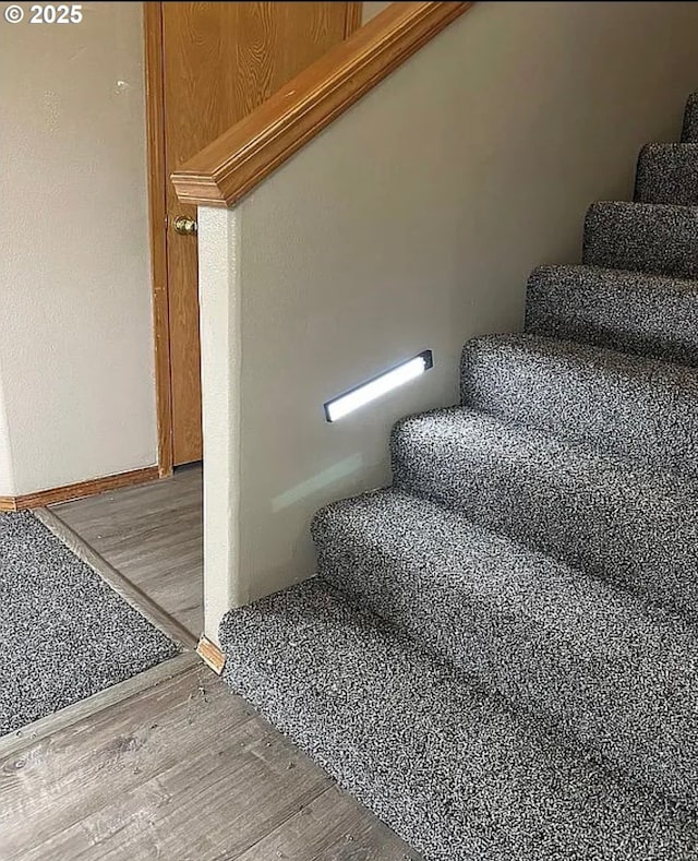 14237 SE Lee Ave, Milwaukie, OR 97267 - staircase featuring wood finished floors and baseboards