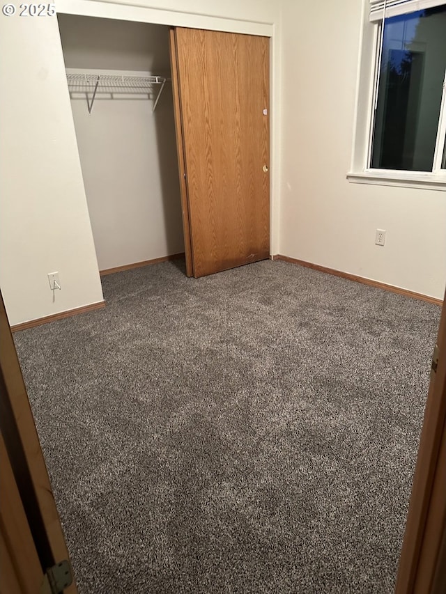 14237 SE Lee Ave, Milwaukie, OR 97267 - unfurnished bedroom featuring baseboards, a closet, and carpet flooring