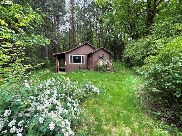56294 Hall Dr, Mckenzie Bridge, OR 97413 - view of front of home featuring a forest view