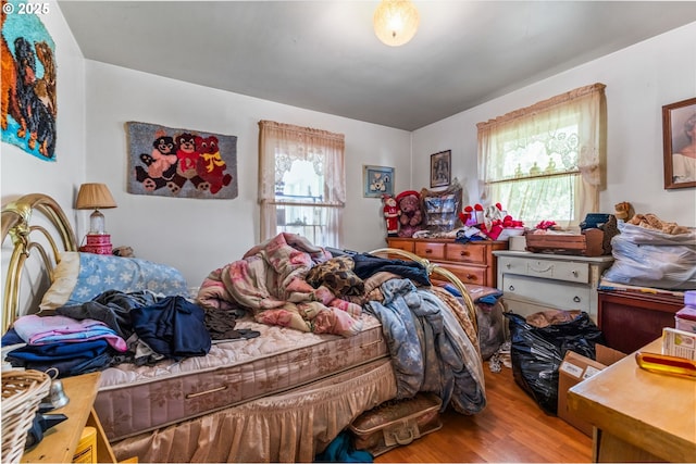 bedroom featuring hardwood / wood-style floors