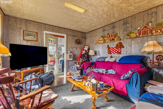 living room featuring wooden walls