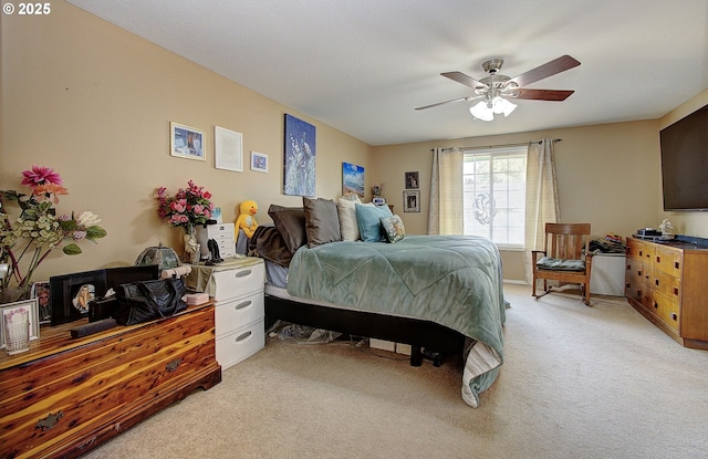 bedroom featuring ceiling fan and light colored carpet