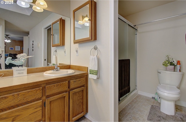 bathroom featuring an enclosed shower, vanity, ceiling fan, and tile patterned floors