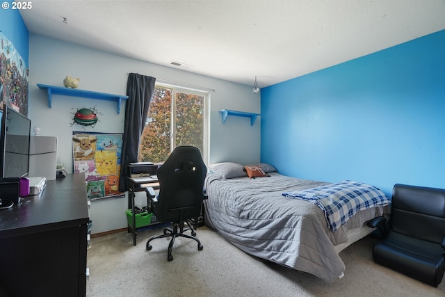 carpeted bedroom with visible vents