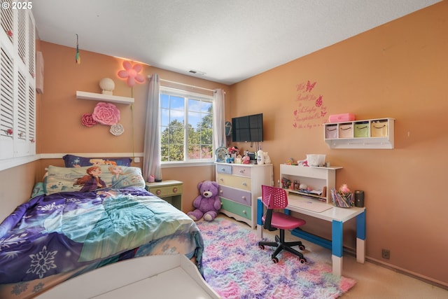 bedroom with baseboards, carpet, and visible vents
