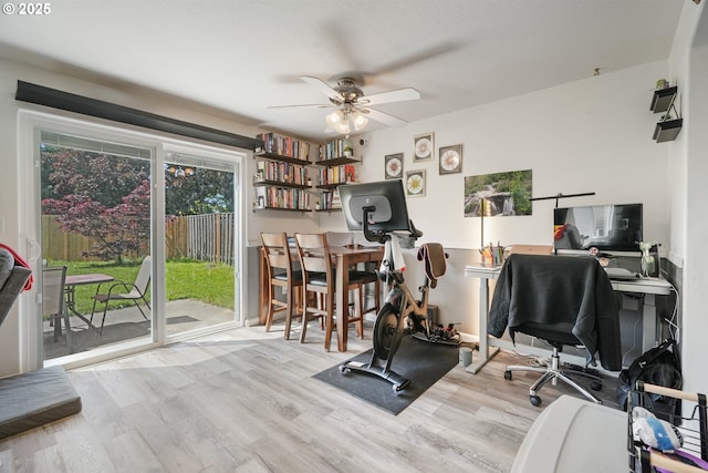 office with ceiling fan and wood finished floors