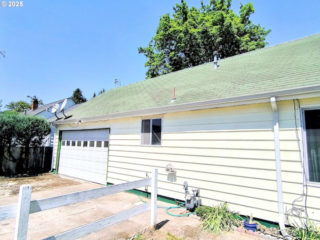 123 1st St, Dillard, OR 97432 - view of side of home featuring roof with shingles and fence