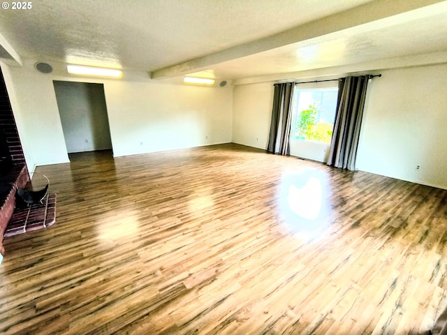 123 1st St, Dillard, OR 97432 - spare room featuring wood finished floors and a textured ceiling