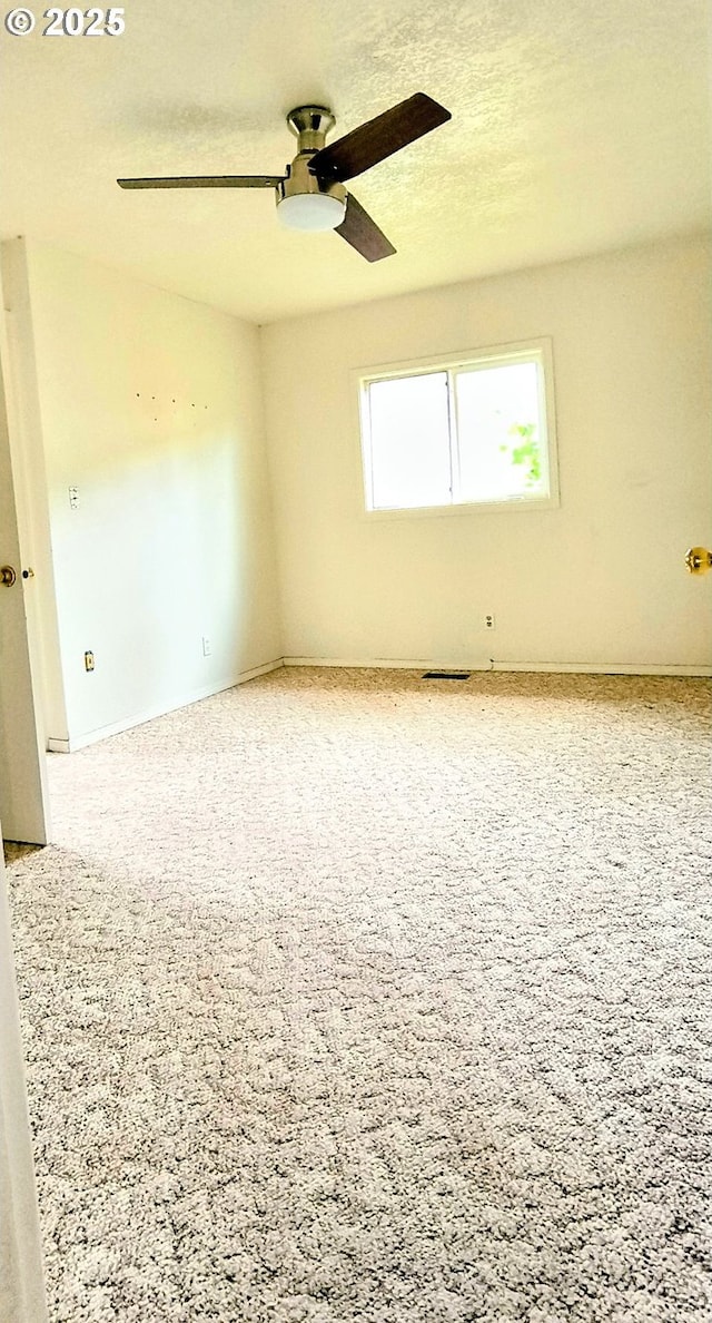 123 1st St, Dillard, OR 97432 - carpeted empty room with a ceiling fan