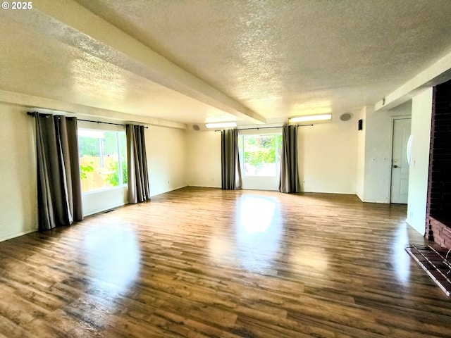 123 1st St, Dillard, OR 97432 - empty room with a textured ceiling and wood finished floors