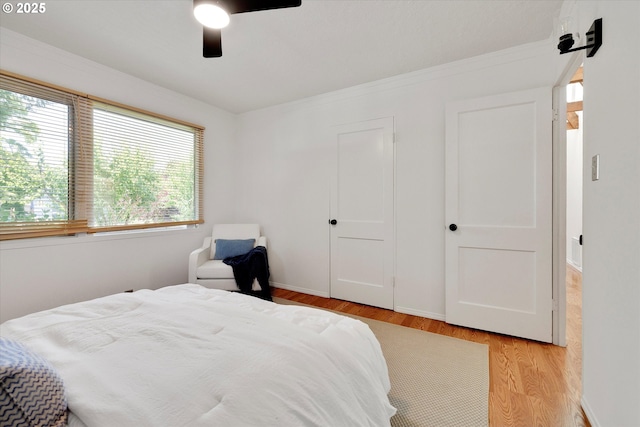 4429 SE Raymond St, Portland, OR 97206 - bedroom featuring light wood finished floors and ceiling fan
