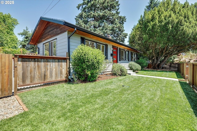 4429 SE Raymond St, Portland, OR 97206 - view of front of house with a fenced backyard
