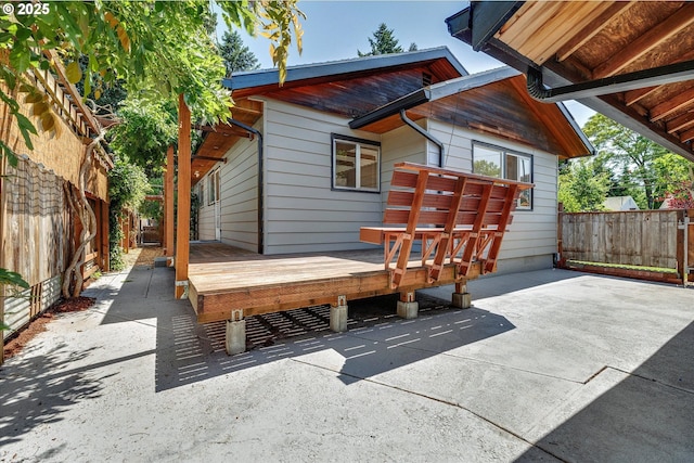 4429 SE Raymond St, Portland, OR 97206 - fenced backyard featuring a deck and a patio area