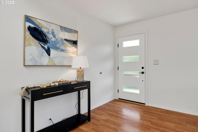 4429 SE Raymond St, Portland, OR 97206 - entryway featuring wood finished floors and baseboards