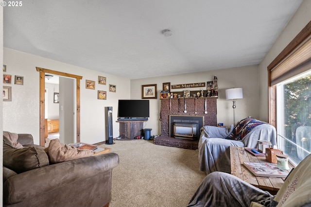 carpeted living room featuring a brick fireplace