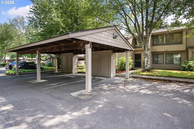 1771 NW 143rd Ave Unit 38, Portland, OR 97229 - covered parking lot featuring a storage unit
