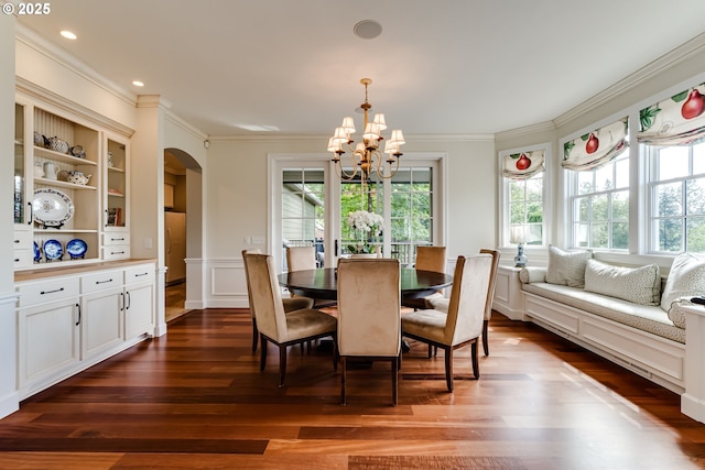 2030 W 34th Ave, Eugene, OR 97405 - dining room with a chandelier, plenty of natural light, arched walkways, crown molding, and dark wood finished floors