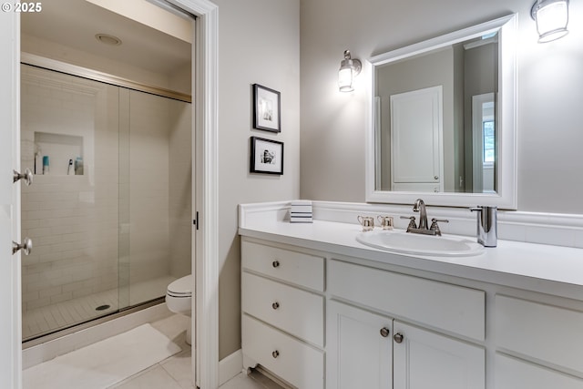 2030 W 34th Ave, Eugene, OR 97405 - bathroom with toilet, a shower stall, vanity, and tile patterned floors