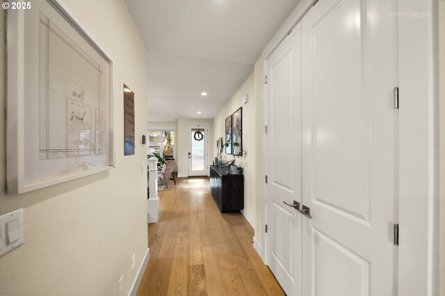 hall featuring light hardwood / wood-style floors