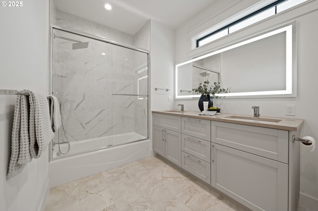 full bathroom with marble finish floors, enclosed tub / shower combo, double vanity, and recessed lighting