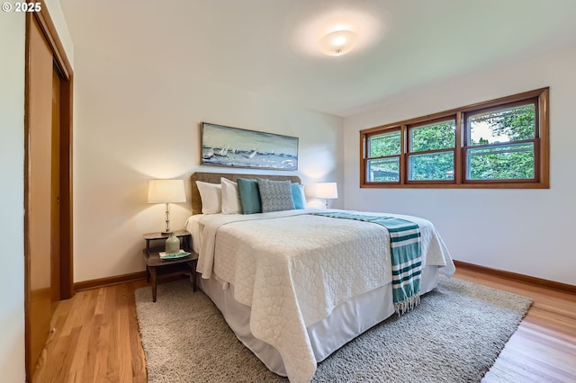4645 NE 42nd Ave, Portland, OR 97218 - bedroom featuring light wood-type flooring and baseboards