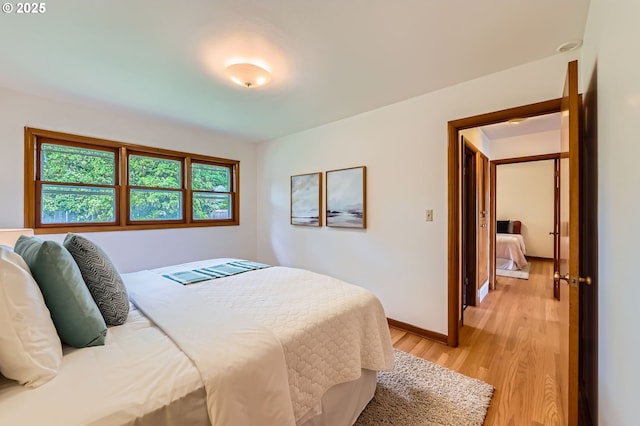4645 NE 42nd Ave, Portland, OR 97218 - bedroom featuring light wood finished floors and baseboards