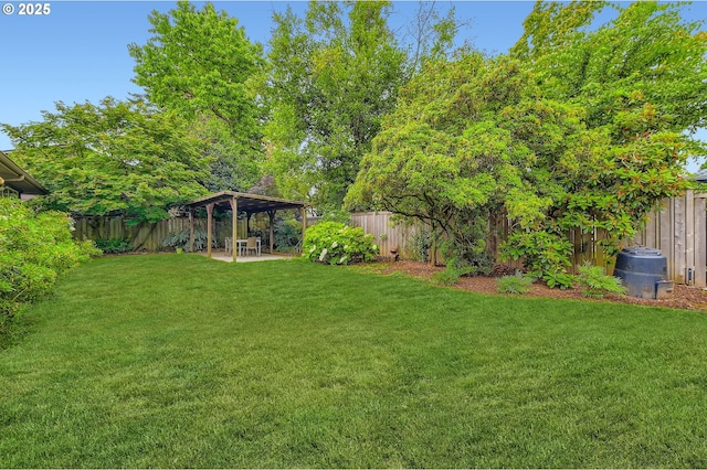 4645 NE 42nd Ave, Portland, OR 97218 - fenced backyard with a patio, a carport, and a gazebo
