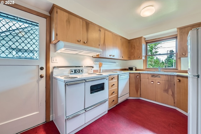 4645 NE 42nd Ave, Portland, OR 97218 - kitchen featuring under cabinet range hood, white appliances, and light countertops
