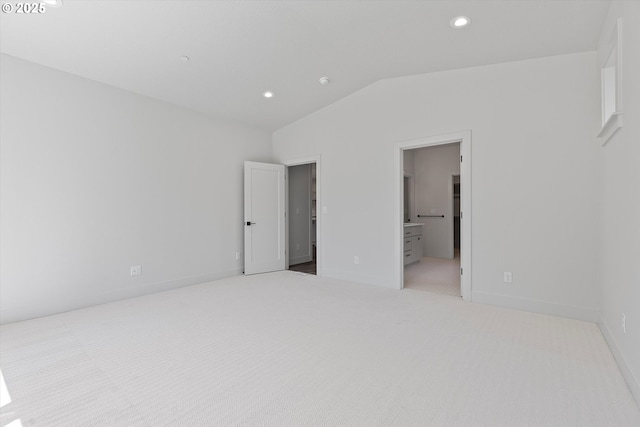 14196 SE Iseli Ln, Clackamas, OR 97015 - unfurnished bedroom with lofted ceiling, carpet floors, recessed lighting, and connected bathroom