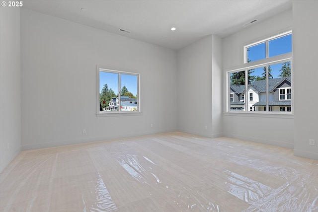 14196 SE Iseli Ln, Clackamas, OR 97015 - spare room featuring healthy amount of natural light and recessed lighting