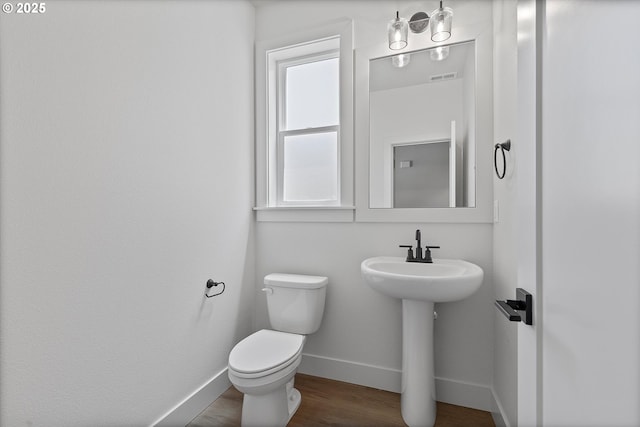 14196 SE Iseli Ln, Clackamas, OR 97015 - bathroom featuring baseboards and wood finished floors